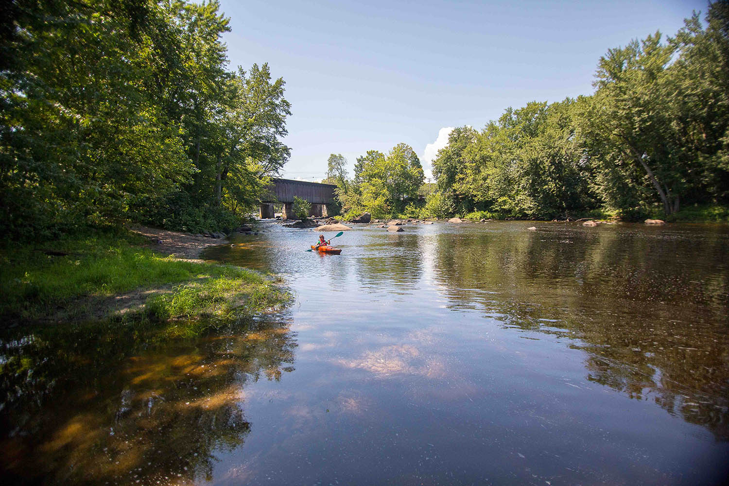 People kayaking on a lake