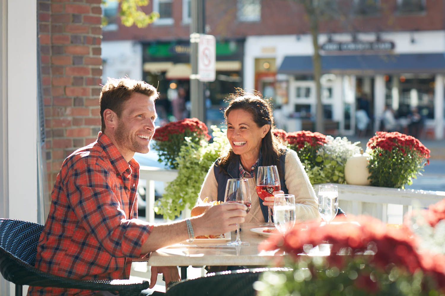 couple sitting outdoors at a restaurant