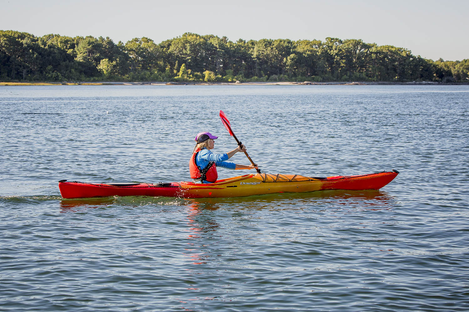 Person Kayaking down a river