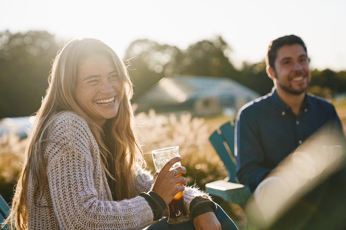 A couple drinking at a brewery