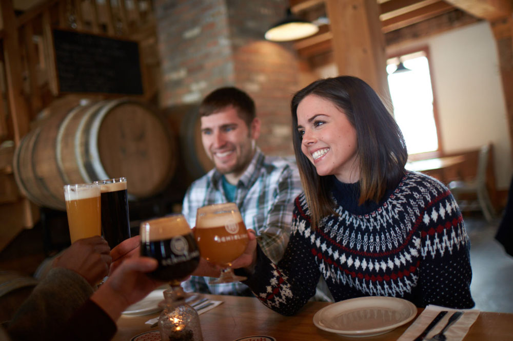 couple having a drink at a brewery