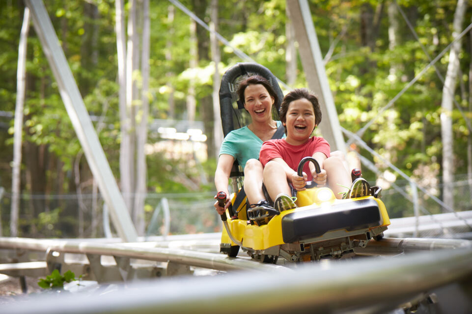 People riding a rollarcoaster