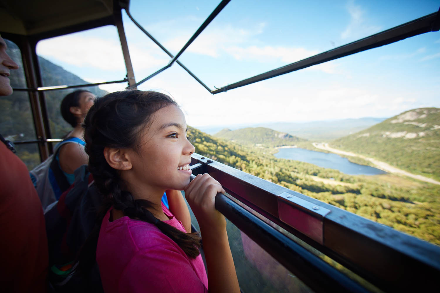 A little girl in a chair lift