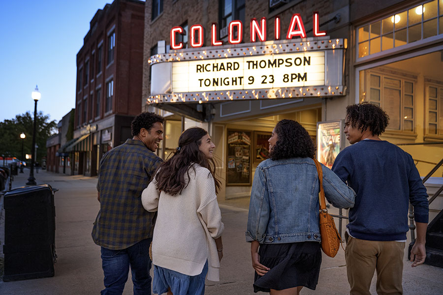 Friends going into a theatre