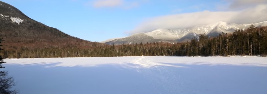 Lonesome Lake Hut Covered in snow