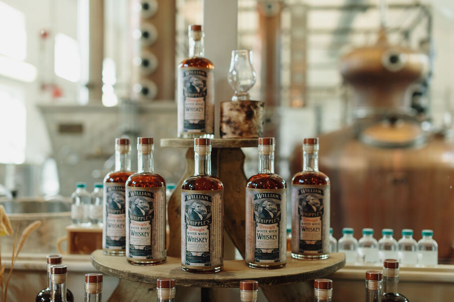 distilled bottles sitting on a table