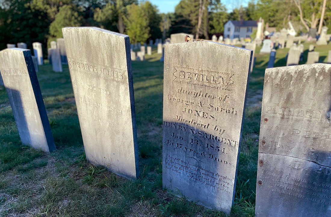 old graves standing in a graveyard