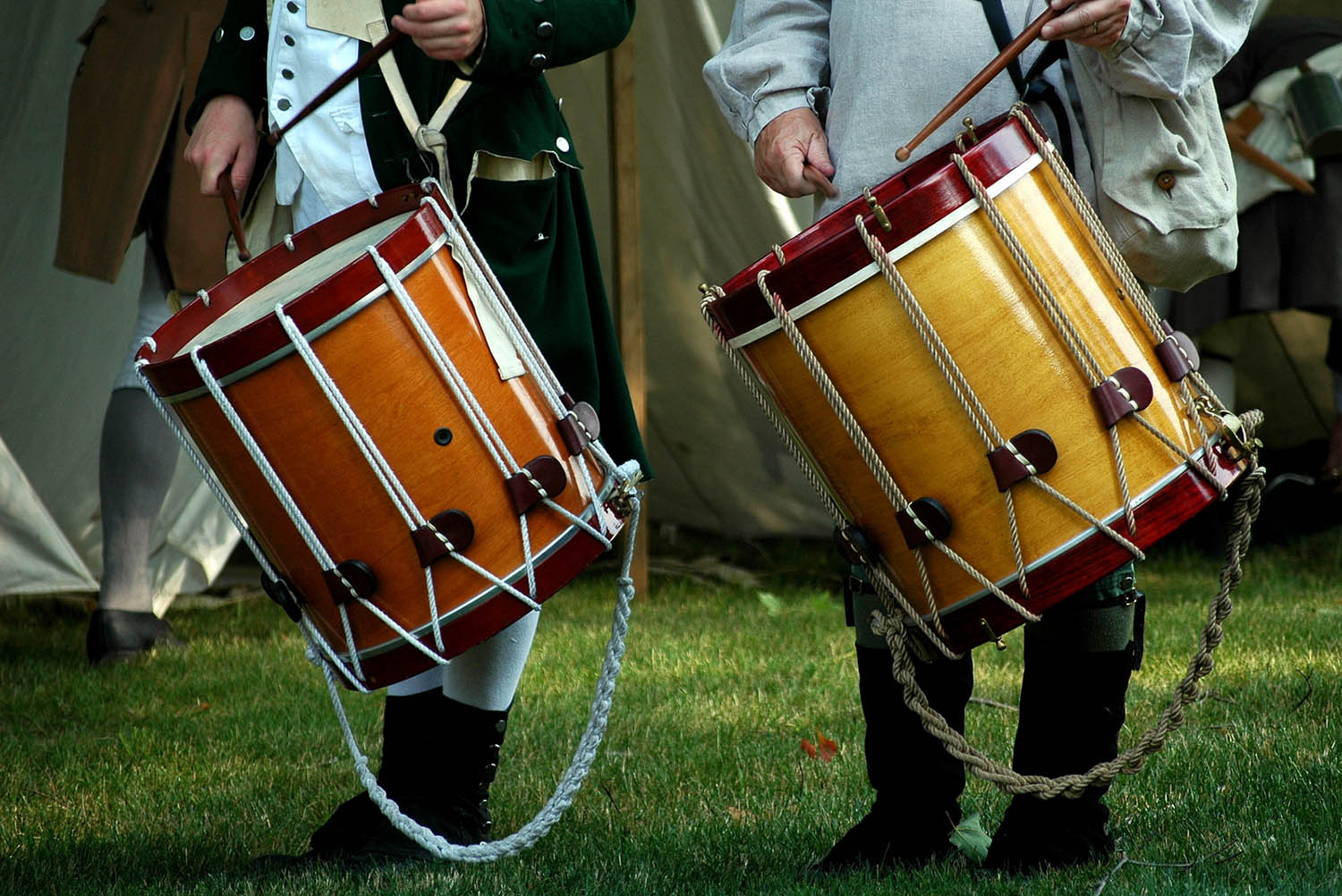 image of people playing historical drums