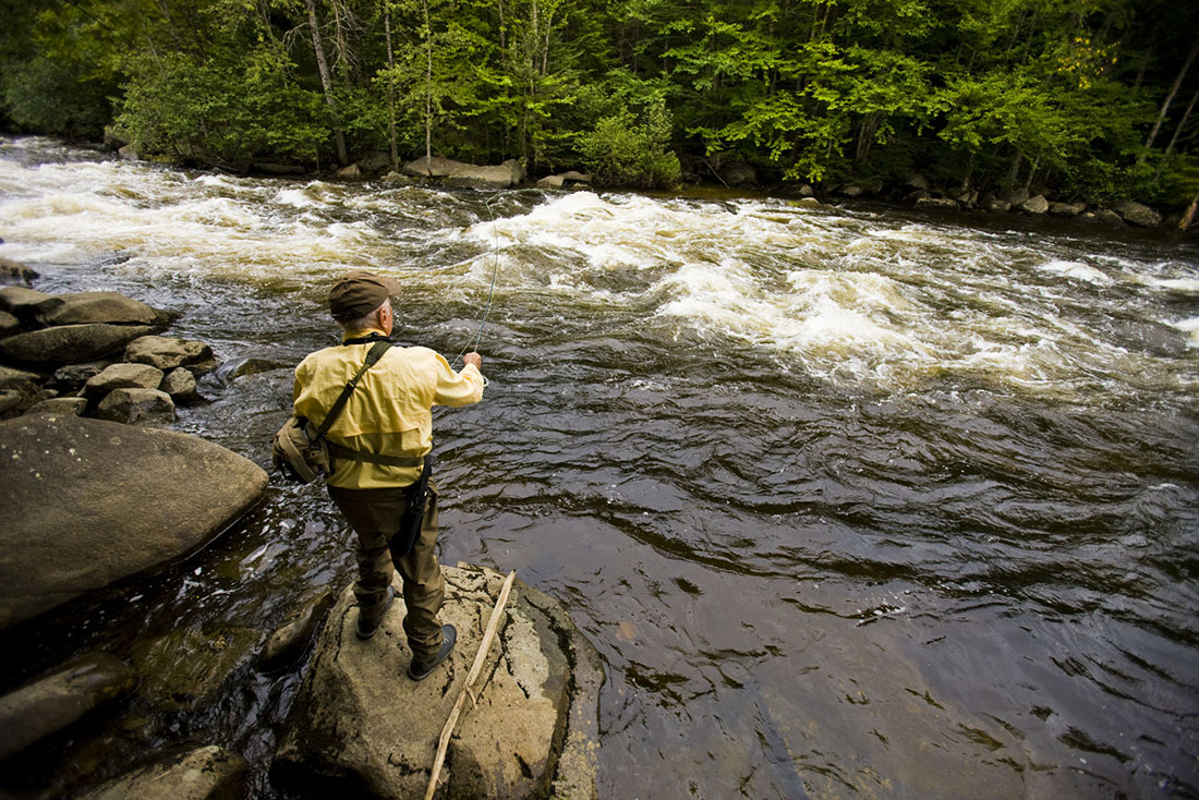 man fly fishing