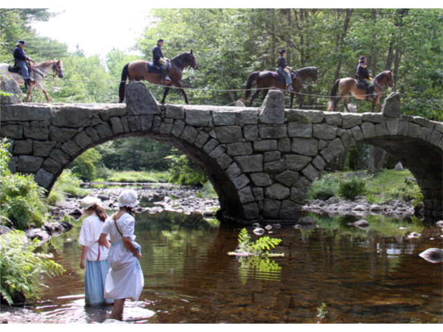 Cavalry going over the Carr stone arch bridge in Hillsborough