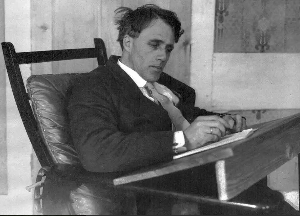 Robert Frost at home in his Franconia study, 1916.