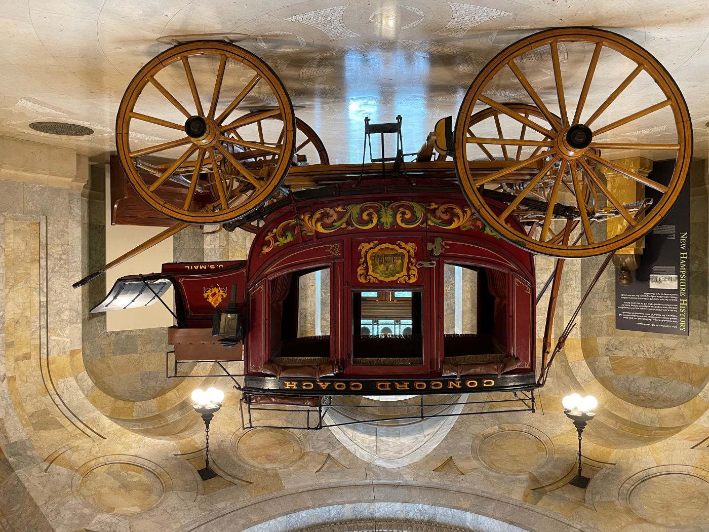 This 1855 Concord coach was manufactured by the Abbot & Downing Company of Concord, New Hampshire. See it on display in the rotunda of the New Hampshire Historical Society!