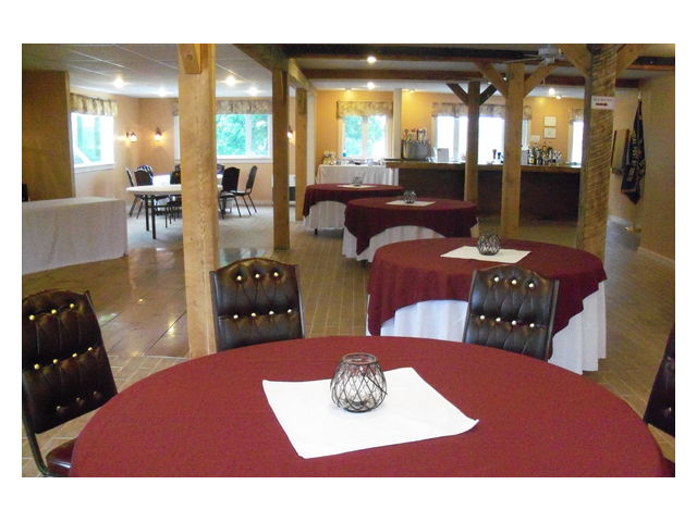 Rustic post and beam indoor dining room