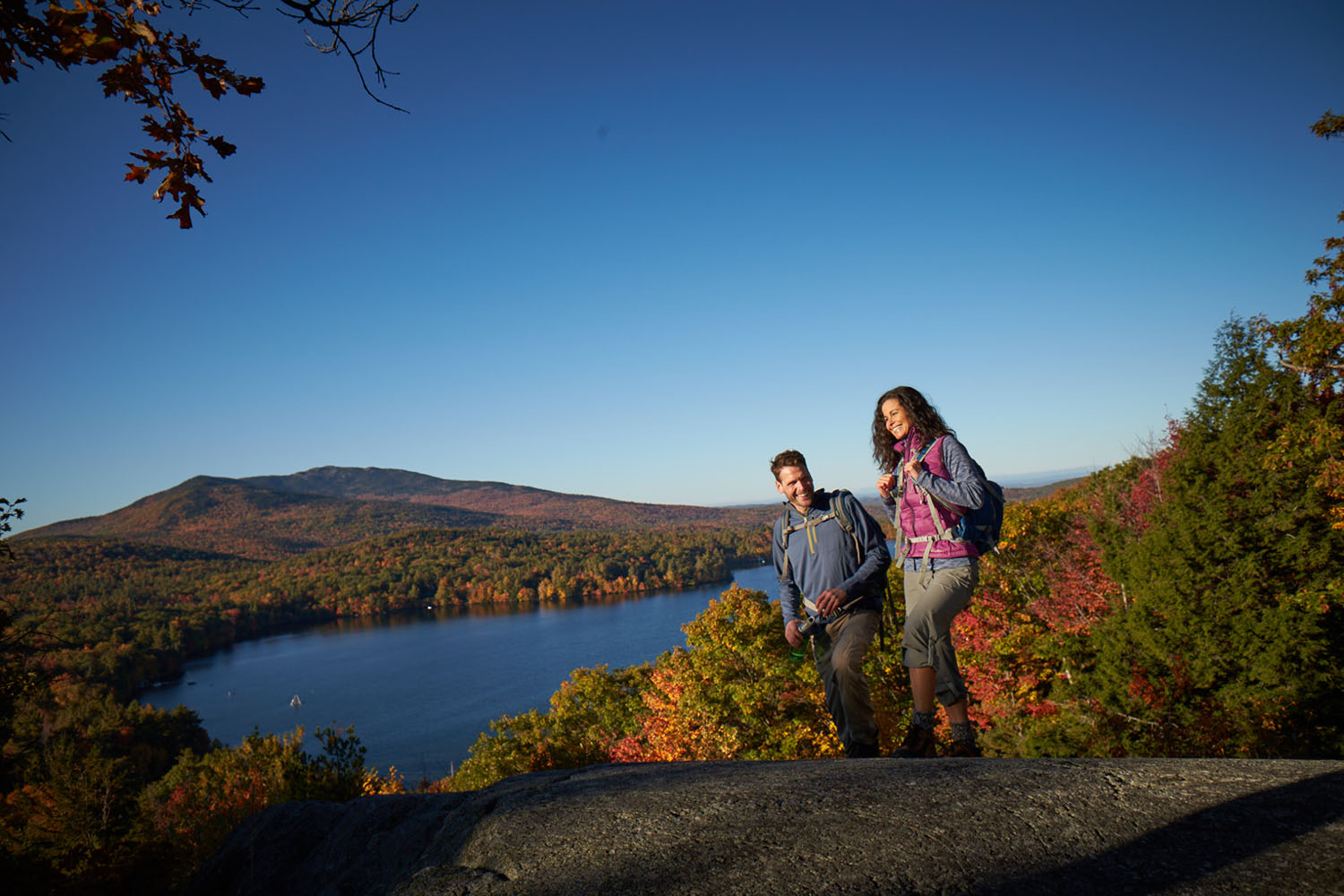 hikers on a mountain in fall