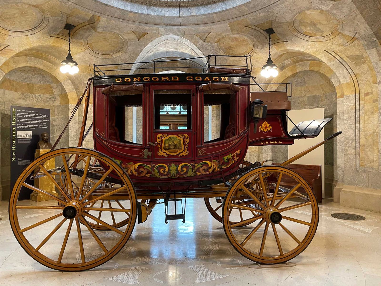 This 1855 Concord coach was manufactured by the Abbot & Downing Company of Concord, New Hampshire. See it on display in the rotunda of the New Hampshire Historical Society!